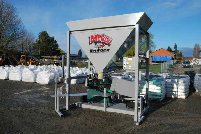 The Bag Lady’s Megga Bagger sandbagging machine operating on-site